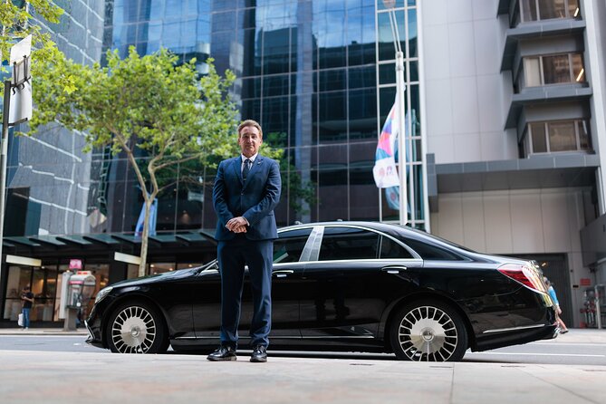 Luxury Airport Transfer to Melbourne CBD - The airport welcome and luggage handoff