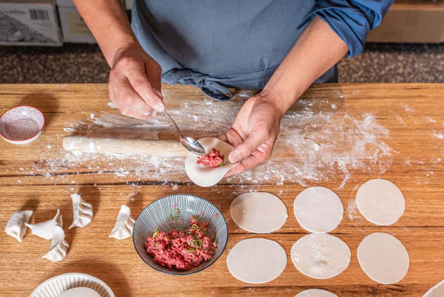 Melbourne: Chinese Dumpling Cooking Class with a Drink - From chef demonstration to your own cooking station