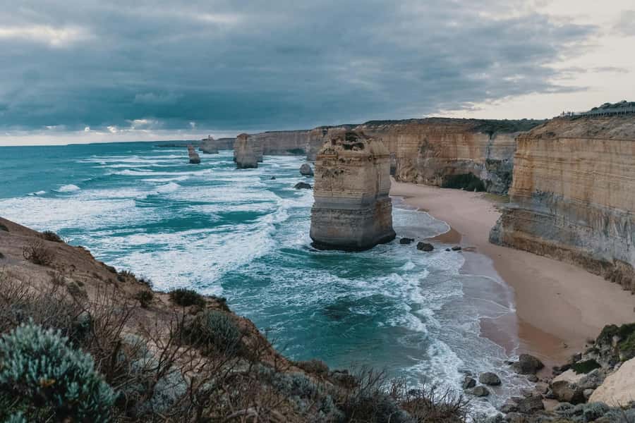 Melbourne: Great Ocean Road Adventure with Iconic Stops - Split Point Lighthouse and its red-and-white tower